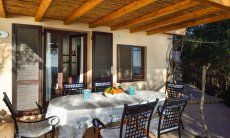 Nido 1 | Shaded Terrace with a dining table Shaded Terrace with a dining table