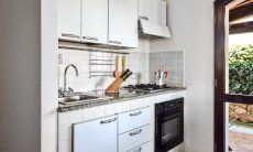 Villa Le Ginestre 2 | Fully equipped kitchen upstairs with oven, gas stove and big fridge with freezer Fully equipped kitchen upstairs with oven, gas stove and big fridge with freezer