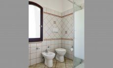 Villa Le Ginestre 2 | Bathroom 1 upstairs with shower and bidet Bathroom 1 upstairs with shower and bidet