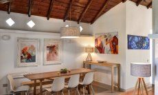 Villetta Quattro | Dining area with a big table Dining area with a big table