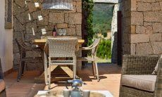 Li Conchi 4 | Terrace with a dining table and lounge area Terrace