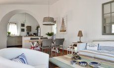 Li Conchi 4 | Living room with a view towards the open kitchen in the background Living with dining area and kitchen in the background