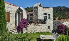 Li Conchi 5 | View from the garden to the house Holiday home Li Conchi 5 with garden and terrace