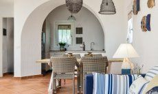 Li Conchi 5 | Living area with a view towards the open and modern kitchen Living, Dining and Kitchen in the background