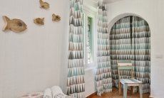 Li Conchi 5 | Bedroom with window and cupboard Bedroom with window and cupboard