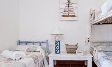 Casa 24 | Bedroom 2 with single bed and bunk bed Bedroom 2 with single bed and bunk bed