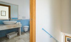 Villa del Campo | Bath 1 on the first floor and stairs to the ground floor Bathroom ground floor with a shower