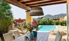 Villa Campidano 8 | Dining table with the pool in the background Dining with view of the Pool