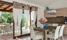 Villa Campidano 8 | Modern and bright dining room with an open kitchen Bright dining room with kitchen