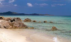 Villa Palme | The white sand charmes everyone Rock formation at the beach