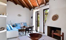 Stylish living area with a sofa corner and chimney 