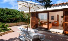 Villa Massimo | Terrace with a glas sliding door to the living area Terrace with a glas sliding door to the living area