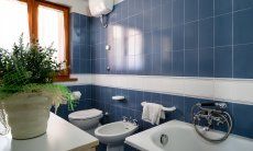 Villa Marco | Modern and bright bathroom with bathtube and bidet Modern and bright bathroom with bathtube and bidet