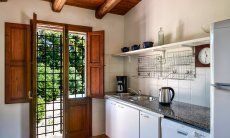 Kitchen with door to the pool