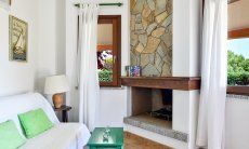 Villa Daniele | Fireplace Fireplace inside opposite the sofa