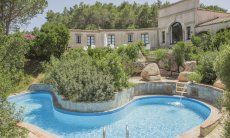 Villa Is Molas Monte | Beanlike shaped pool and the half moon shaped villa with all panoramic windows 2018 New Picture
