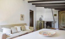 Casa Su Faru 5 | Living room with fire place and sofa corner Living room with fire place and sofa corner