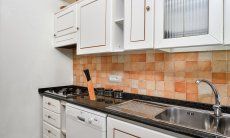 Villa Pino | Kitchen with gas stove and dishwasher Kitchen