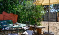 Villetta Pino | Table outside and entrance gate (parking space) New Picture 2018