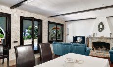 Villa Philippine | Living area with dining table and chimney Living area with dining table and chimney