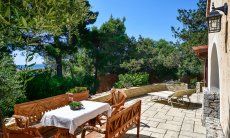 Villa Philippine | Terrace with dining table, sun beds and sea view Terrace with dining table, sun beds and sea view