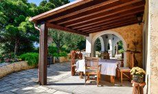 Villa Philippine | Roofed terrace with dining table Roofed terrace with dining table