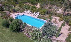 Villa Isabelle | Aerial view of the pool area with Mediterranean plants Aerial view of the pool area with Mediterranean plants