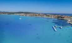 Airview of the crystal clear sea in front of Golfo Aranci