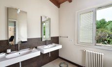 Villa Caroline | Bathroom 1 with two sinks Bathroom with two sinks
