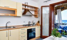 Apartment Castededdu 5 | Fully equipped kitchen with terrace access Fully equipped kitchen with terrace access