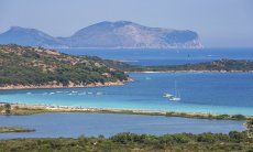 Casa Graziella | Aerial view of San Paolo Beach and lagoon of Porto San Paolo with the isle of Tavolara