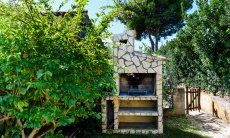 Casa Meloni 2 | BBQ area in the garden BBQ area in the garden Meloni 2 in Sant Elmo