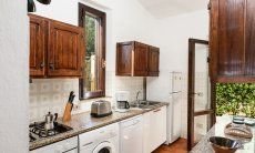 Fully equipped kitchen with garden access