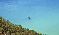 Crystal clear sea with rubber dingee, Torre delle Stelle