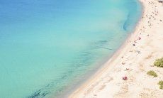 White sandy beach with crystal clear sea of Solanas