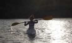 Villa Pola | Kayaker at sunset Kayaker at sunset