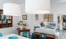 Villa Pola | Dining table with sofa corner in the back Dining table with sofa corner in the back