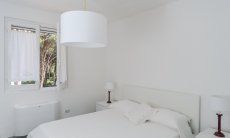 Villa Pola | Bedroom 1 on the ground floor with window to the garden Bedroom 1 on the ground floor with window to the garden