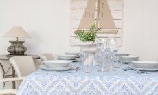 Li Conchi 34 | Dining table set with fine dishes, ready for eating Presentation Holiday Home Li Conchi 34, Cala Sinzias