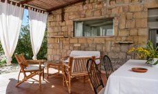 Casa Su Faru 3 | Comfortable sofacorner in bamboo for relax on the private terrace Sofacorner in bamboo on the terrace of Su Faru 3 Pula