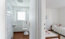 Casa Su Faru 3 | Bedroom 2 with two single beds and bath 1 next door Bedroom with two single beds and bath next door Su Faru 3 Pula