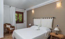 Apartment Orri 1 | Bedroom 2 with double bed and garden view Orri 1 Tortoli, East Sardinia