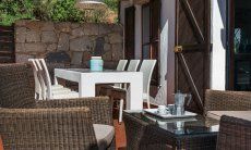 Casa 17 | Terrace with comfortable lounge furniture and dining table Casa 17, Sant Elmo, South Sardinia