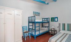 Casa 17 | Bedroom 2 with bunk bed and one single bed Casa 17, Sant Elmo, South Sardinia