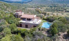 Villa Torretta Chia | Airview of Torretta Chia with garden and pool Airview of Torretta Chia