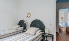 Casa 13 | Bedroom 2 with three single beds Casa 13, Sant Elmo