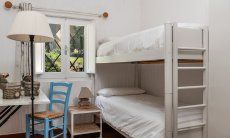 Casa 23 | Bedroom 2 with bunk bed, desk and garden view Casa 23, Sant Elmo