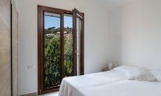Villa del Campo | Bedroom 2 on the first floor with mountain view and double bed Villa del Campo, Is Molas, Pula