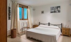 Villa del Campo | Bedroom 4 with double sized bed on the basement floor Villa del Campo, Is Molas, Pula