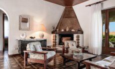 Living room with big fire place, Villa Palme, Costa Rei
